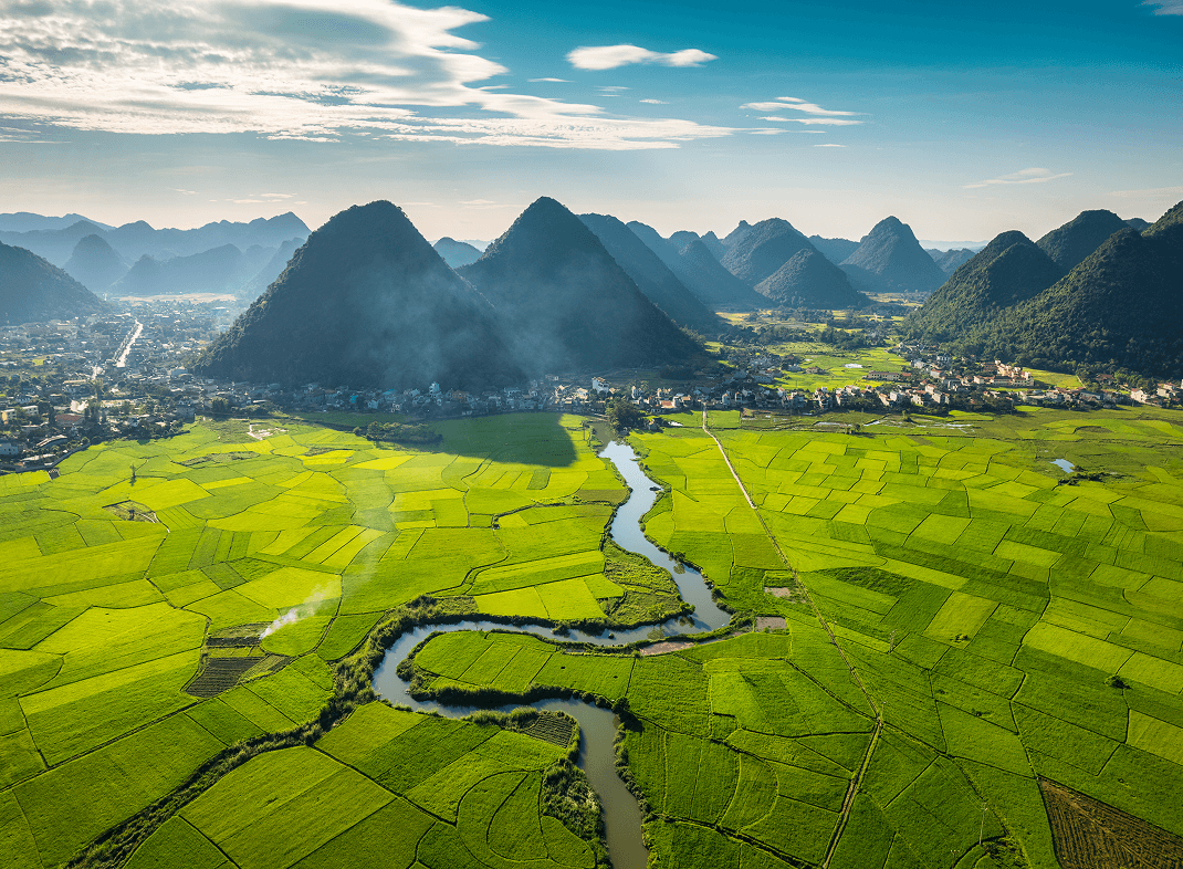 beautiful-bac-son-valley-with-lush-rice-field-mountain-range-winding-river-rural-village-vietnam 1