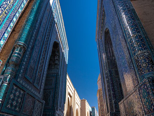 june-24-2023-samarkand-uzbekistan-beautiful-historical-cemetery-shahi-zinda-entry-gate-with-finely-decorated-by-blue-turquoise-stone-mosaic-mausoleums-samarkand-uzbekistan 1